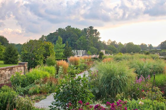 A wide angle shot of the Rose Garden and fountains at Longwood Garden.